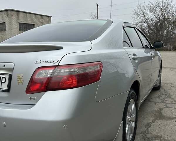 Серый Тойота Камри, объемом двигателя 3.46 л и пробегом 222 тыс. км за 10000 $, фото 9 на Automoto.ua