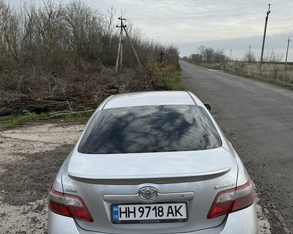 Серый Тойота Камри, объемом двигателя 2.4 л и пробегом 311 тыс. км за 7700 $, фото 7 на Automoto.ua