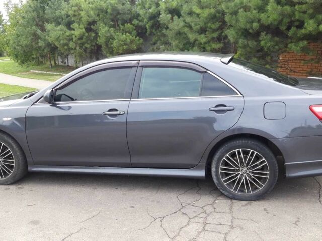 Серый Тойота Камри, объемом двигателя 2.4 л и пробегом 270 тыс. км за 8900 $, фото 1 на Automoto.ua