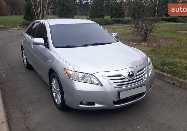 Серый Тойота Камри, объемом двигателя 2.4 л и пробегом 193 тыс. км за 10700 $, фото 9 на Automoto.ua