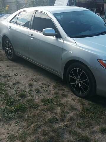 Серый Тойота Камри, объемом двигателя 2.4 л и пробегом 286 тыс. км за 9500 $, фото 3 на Automoto.ua