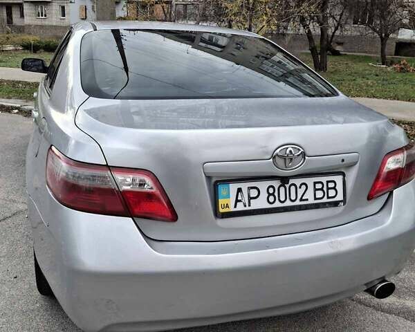 Серый Тойота Камри, объемом двигателя 2.4 л и пробегом 215 тыс. км за 6900 $, фото 2 на Automoto.ua