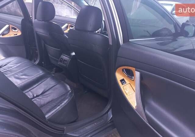 Серый Тойота Камри, объемом двигателя 2.36 л и пробегом 305 тыс. км за 7800 $, фото 19 на Automoto.ua