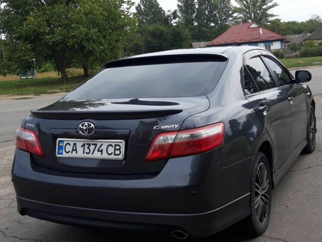 Серый Тойота Камри, объемом двигателя 2.4 л и пробегом 270 тыс. км за 8900 $, фото 3 на Automoto.ua