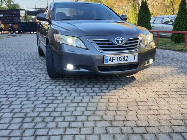 Серый Тойота Камри, объемом двигателя 2.4 л и пробегом 193 тыс. км за 9900 $, фото 1 на Automoto.ua