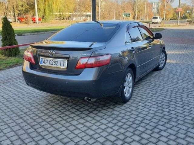 Серый Тойота Камри, объемом двигателя 2.4 л и пробегом 193 тыс. км за 9900 $, фото 4 на Automoto.ua