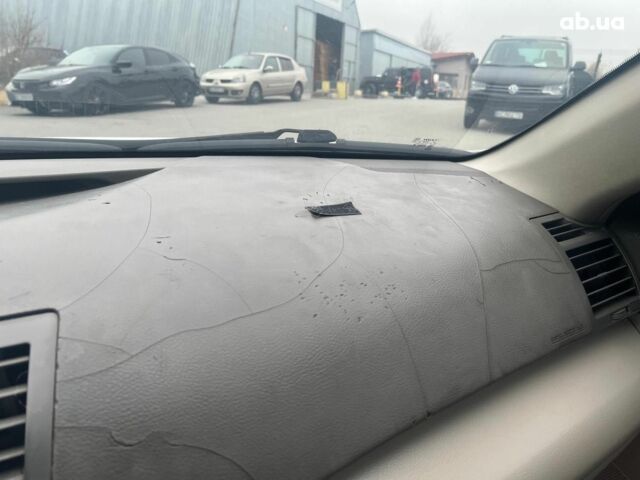 Серый Тойота Камри, объемом двигателя 2.4 л и пробегом 320 тыс. км за 5990 $, фото 20 на Automoto.ua