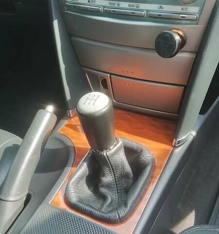 Серый Тойота Камри, объемом двигателя 2.4 л и пробегом 208 тыс. км за 8000 $, фото 11 на Automoto.ua