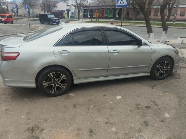 Серый Тойота Камри, объемом двигателя 2.4 л и пробегом 293 тыс. км за 7900 $, фото 3 на Automoto.ua