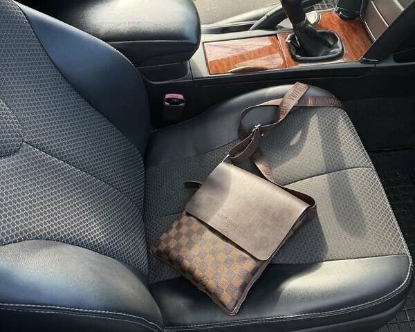 Серый Тойота Камри, объемом двигателя 2.4 л и пробегом 248 тыс. км за 7250 $, фото 1 на Automoto.ua