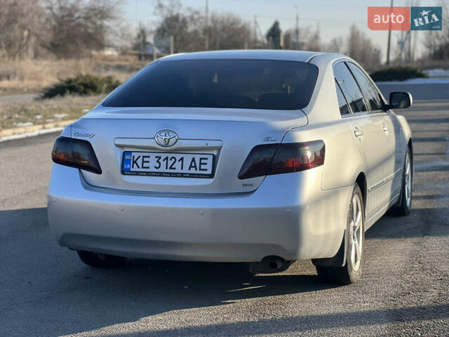 Серый Тойота Камри, объемом двигателя 2.4 л и пробегом 290 тыс. км за 8500 $, фото 1 на Automoto.ua