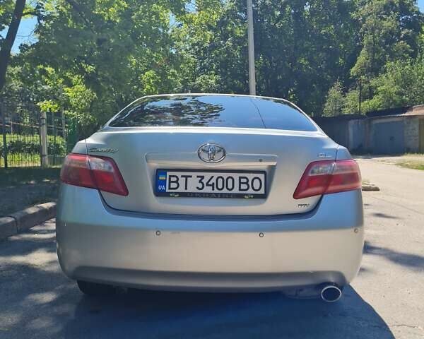 Серый Тойота Камри, объемом двигателя 2.36 л и пробегом 230 тыс. км за 7300 $, фото 1 на Automoto.ua