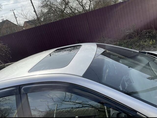 Серый Тойота Камри, объемом двигателя 2.4 л и пробегом 238 тыс. км за 7500 $, фото 4 на Automoto.ua