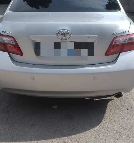 Серый Тойота Камри, объемом двигателя 2.4 л и пробегом 208 тыс. км за 8000 $, фото 1 на Automoto.ua