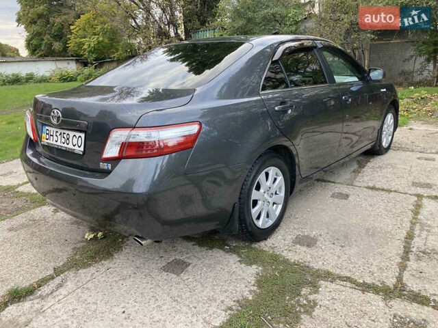 Сірий Тойота Камрі, об'ємом двигуна 2.4 л та пробігом 77 тис. км за 12700 $, фото 18 на Automoto.ua