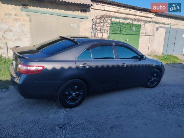 Серый Тойота Камри, объемом двигателя 2.4 л и пробегом 194 тыс. км за 9000 $, фото 11 на Automoto.ua