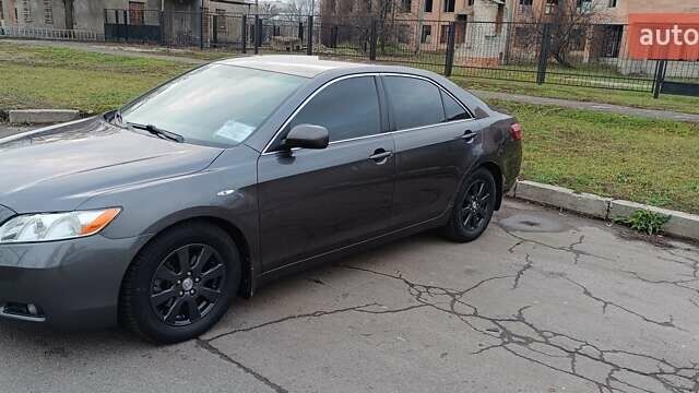 Сірий Тойота Камрі, об'ємом двигуна 2.4 л та пробігом 297 тис. км за 9150 $, фото 20 на Automoto.ua