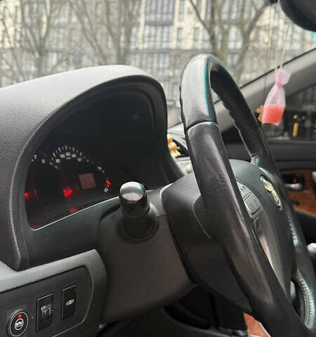 Серый Тойота Камри, объемом двигателя 2.36 л и пробегом 251 тыс. км за 7200 $, фото 13 на Automoto.ua