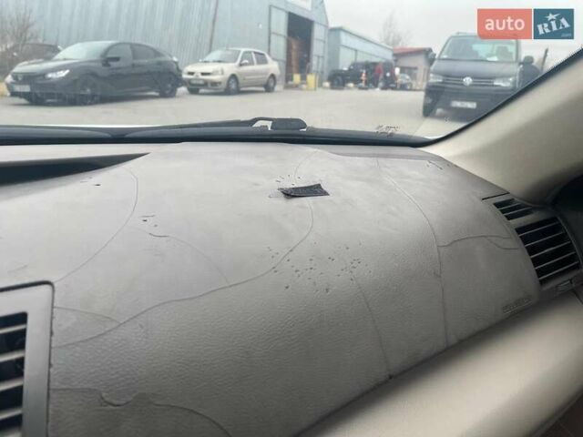 Серый Тойота Камри, объемом двигателя 2.4 л и пробегом 320 тыс. км за 5990 $, фото 21 на Automoto.ua