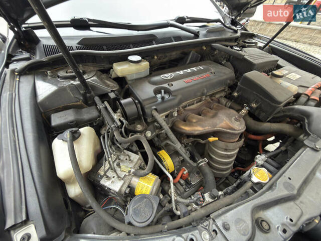 Сірий Тойота Камрі, об'ємом двигуна 2.4 л та пробігом 220 тис. км за 9100 $, фото 73 на Automoto.ua