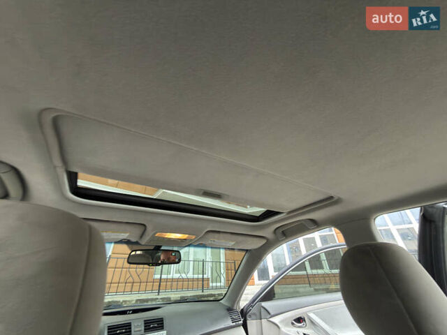 Сірий Тойота Камрі, об'ємом двигуна 2.4 л та пробігом 220 тис. км за 9100 $, фото 48 на Automoto.ua