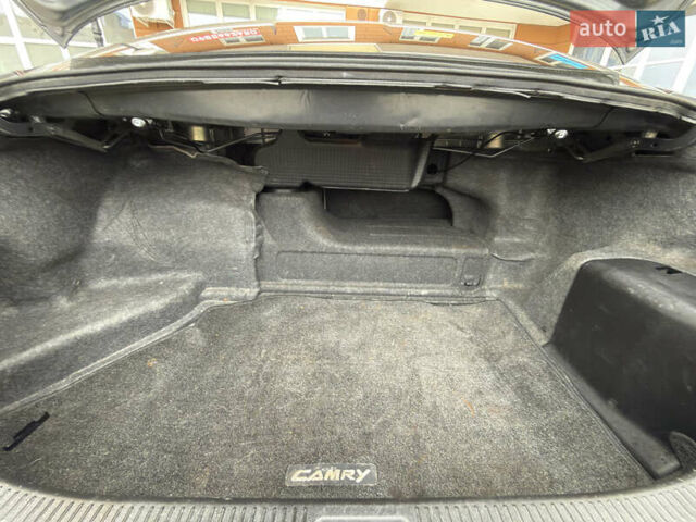 Сірий Тойота Камрі, об'ємом двигуна 2.4 л та пробігом 220 тис. км за 9100 $, фото 42 на Automoto.ua
