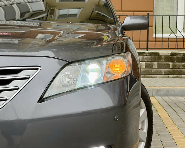 Сірий Тойота Камрі, об'ємом двигуна 2.4 л та пробігом 220 тис. км за 9100 $, фото 12 на Automoto.ua