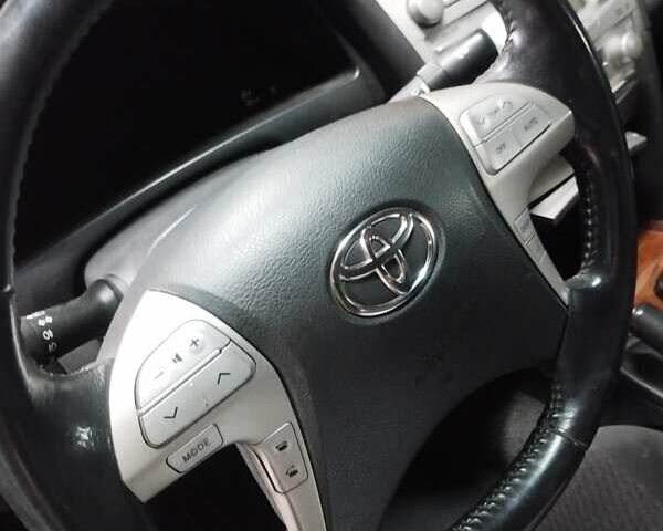 Серый Тойота Камри, объемом двигателя 2.36 л и пробегом 170 тыс. км за 9048 $, фото 5 на Automoto.ua