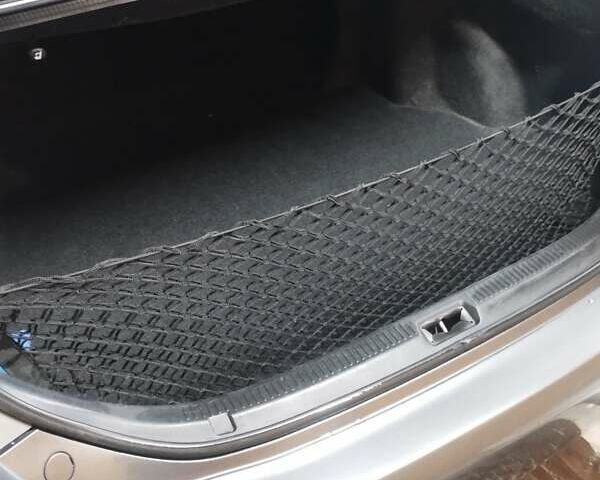 Серый Тойота Камри, объемом двигателя 2.36 л и пробегом 170 тыс. км за 9048 $, фото 7 на Automoto.ua