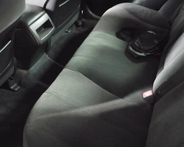 Серый Тойота Камри, объемом двигателя 2.36 л и пробегом 170 тыс. км за 9048 $, фото 9 на Automoto.ua