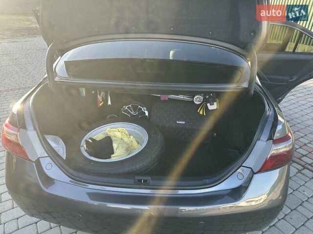 Серый Тойота Камри, объемом двигателя 2.36 л и пробегом 258 тыс. км за 9500 $, фото 15 на Automoto.ua