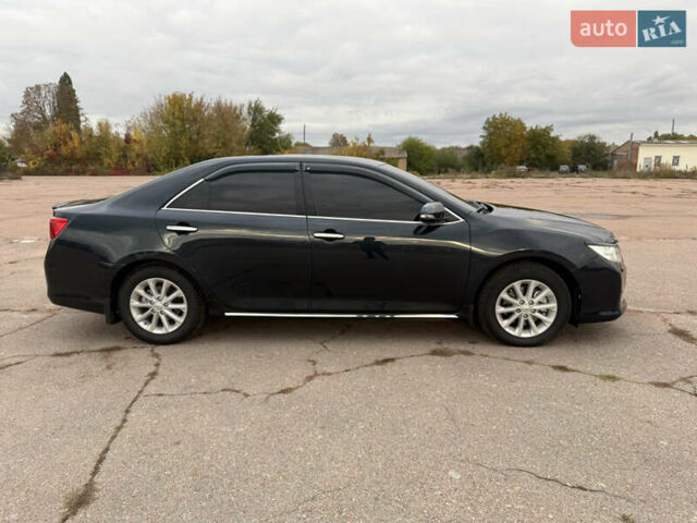 Серый Тойота Камри, объемом двигателя 2.49 л и пробегом 210 тыс. км за 15300 $, фото 4 на Automoto.ua