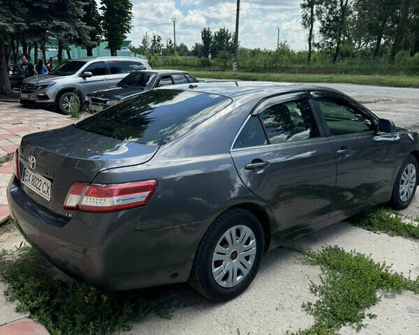 Серый Тойота Камри, объемом двигателя 2.49 л и пробегом 309 тыс. км за 7500 $, фото 3 на Automoto.ua