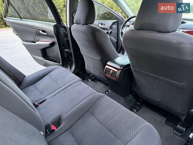 Серый Тойота Камри, объемом двигателя 2.5 л и пробегом 145 тыс. км за 13400 $, фото 30 на Automoto.ua