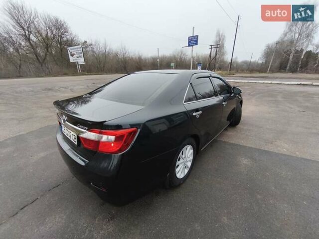 Серый Тойота Камри, объемом двигателя 2.5 л и пробегом 244 тыс. км за 14900 $, фото 5 на Automoto.ua