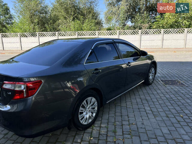 Сірий Тойота Камрі, об'ємом двигуна 2.5 л та пробігом 264 тис. км за 11500 $, фото 7 на Automoto.ua