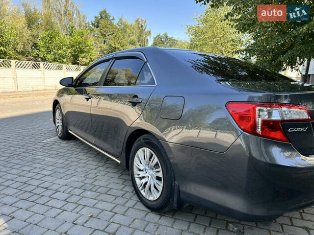 Сірий Тойота Камрі, об'ємом двигуна 2.5 л та пробігом 264 тис. км за 11500 $, фото 12 на Automoto.ua