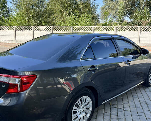 Сірий Тойота Камрі, об'ємом двигуна 2.5 л та пробігом 264 тис. км за 11500 $, фото 5 на Automoto.ua