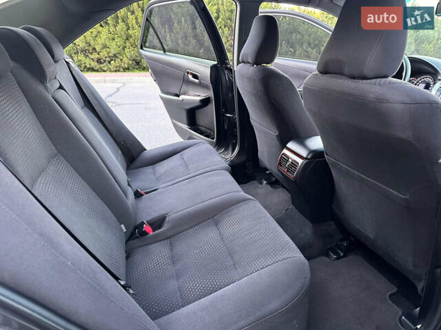 Серый Тойота Камри, объемом двигателя 2.5 л и пробегом 145 тыс. км за 13400 $, фото 29 на Automoto.ua