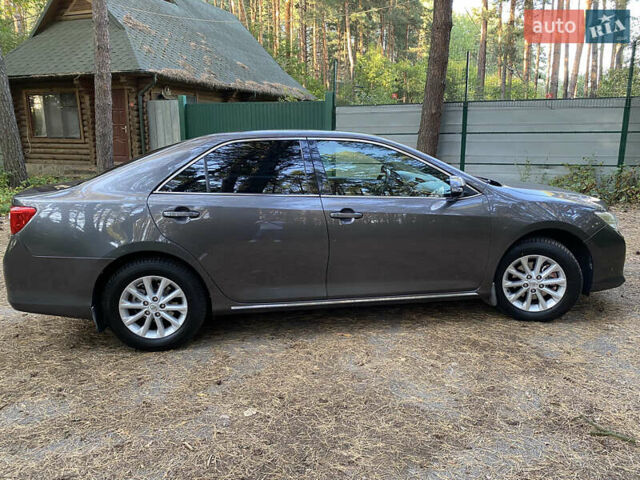 Серый Тойота Камри, объемом двигателя 2.49 л и пробегом 238 тыс. км за 11500 $, фото 5 на Automoto.ua
