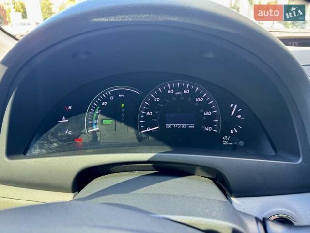 Серый Тойота Камри, объемом двигателя 2.36 л и пробегом 233 тыс. км за 10500 $, фото 7 на Automoto.ua