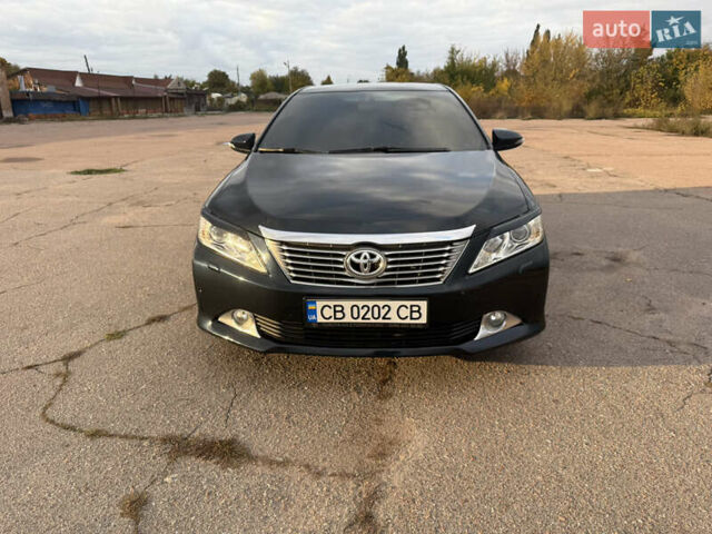 Серый Тойота Камри, объемом двигателя 2.49 л и пробегом 210 тыс. км за 15300 $, фото 2 на Automoto.ua