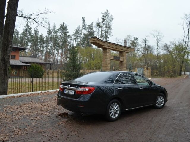 Серый Тойота Камри, объемом двигателя 2.5 л и пробегом 232 тыс. км за 12950 $, фото 4 на Automoto.ua