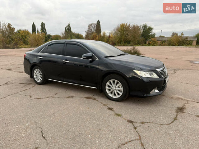 Серый Тойота Камри, объемом двигателя 2.49 л и пробегом 210 тыс. км за 15300 $, фото 3 на Automoto.ua