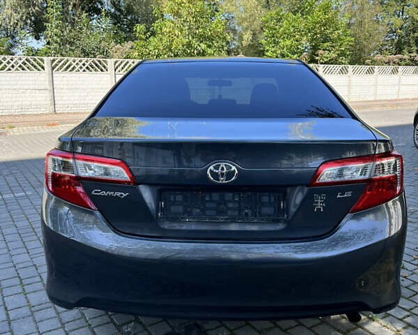 Сірий Тойота Камрі, об'ємом двигуна 2.5 л та пробігом 264 тис. км за 11500 $, фото 19 на Automoto.ua