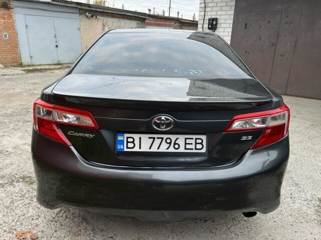 Серый Тойота Камри, объемом двигателя 2.5 л и пробегом 240 тыс. км за 8700 $, фото 3 на Automoto.ua