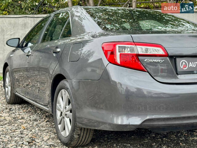 Сірий Тойота Камрі, об'ємом двигуна 2.49 л та пробігом 268 тис. км за 10990 $, фото 5 на Automoto.ua