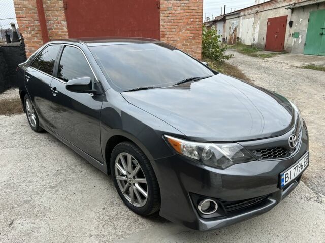 Серый Тойота Камри, объемом двигателя 2.5 л и пробегом 240 тыс. км за 8700 $, фото 6 на Automoto.ua