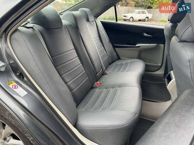 Серый Тойота Камри, объемом двигателя 2.49 л и пробегом 268 тыс. км за 11490 $, фото 10 на Automoto.ua