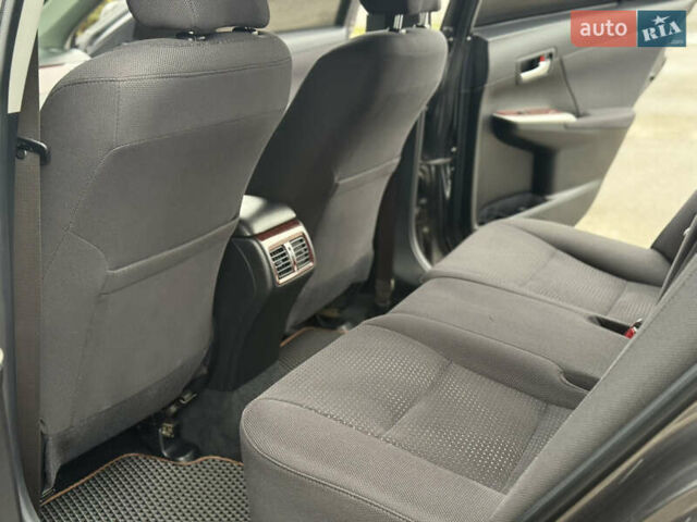 Серый Тойота Камри, объемом двигателя 2.5 л и пробегом 198 тыс. км за 13999 $, фото 27 на Automoto.ua